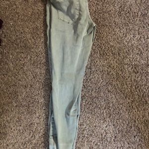 Green skinny jeans
